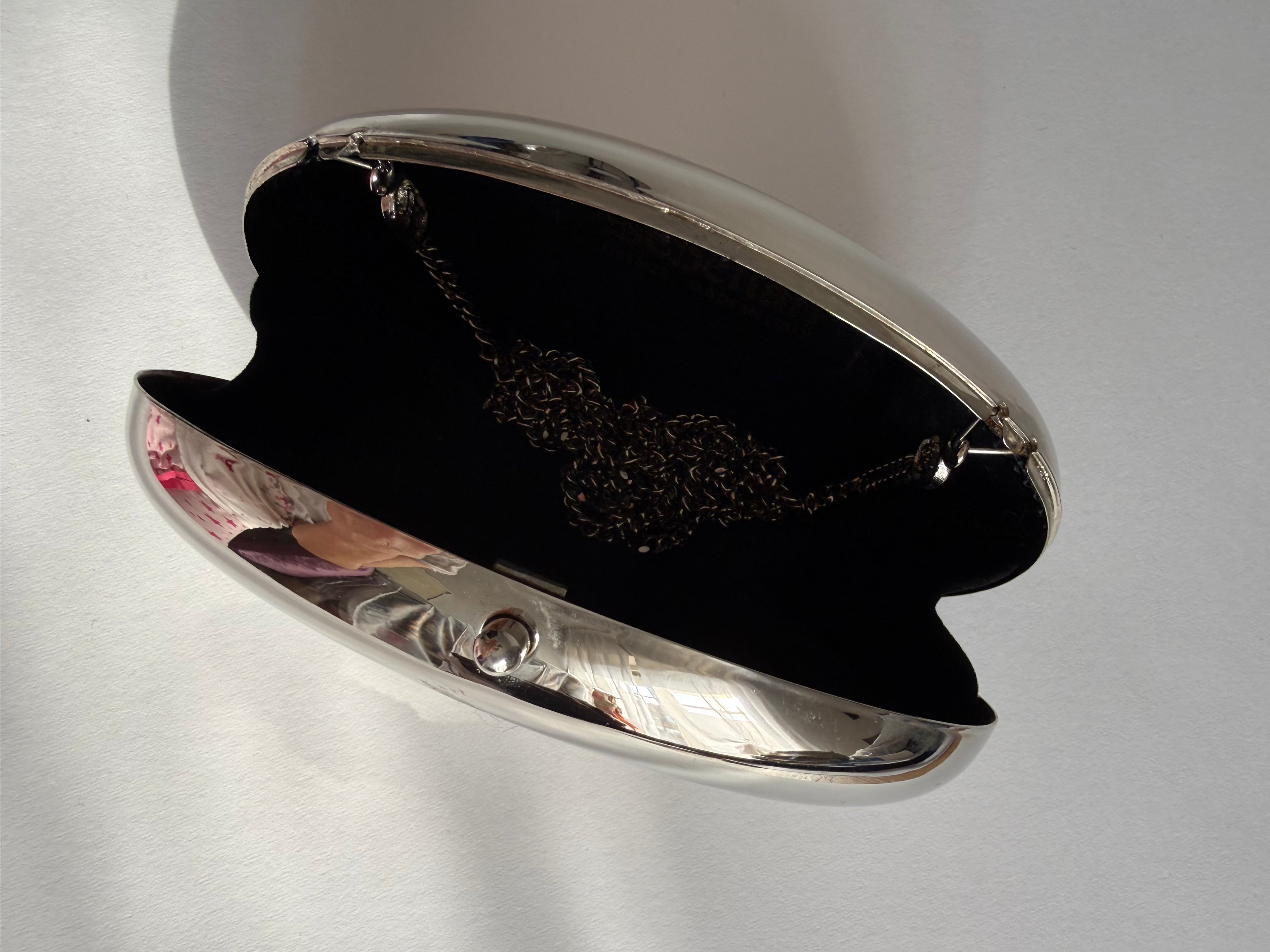 Silver mirror clutch bow strass