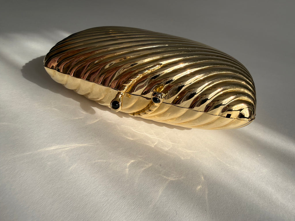 Gold clutch metal Vogini Venice