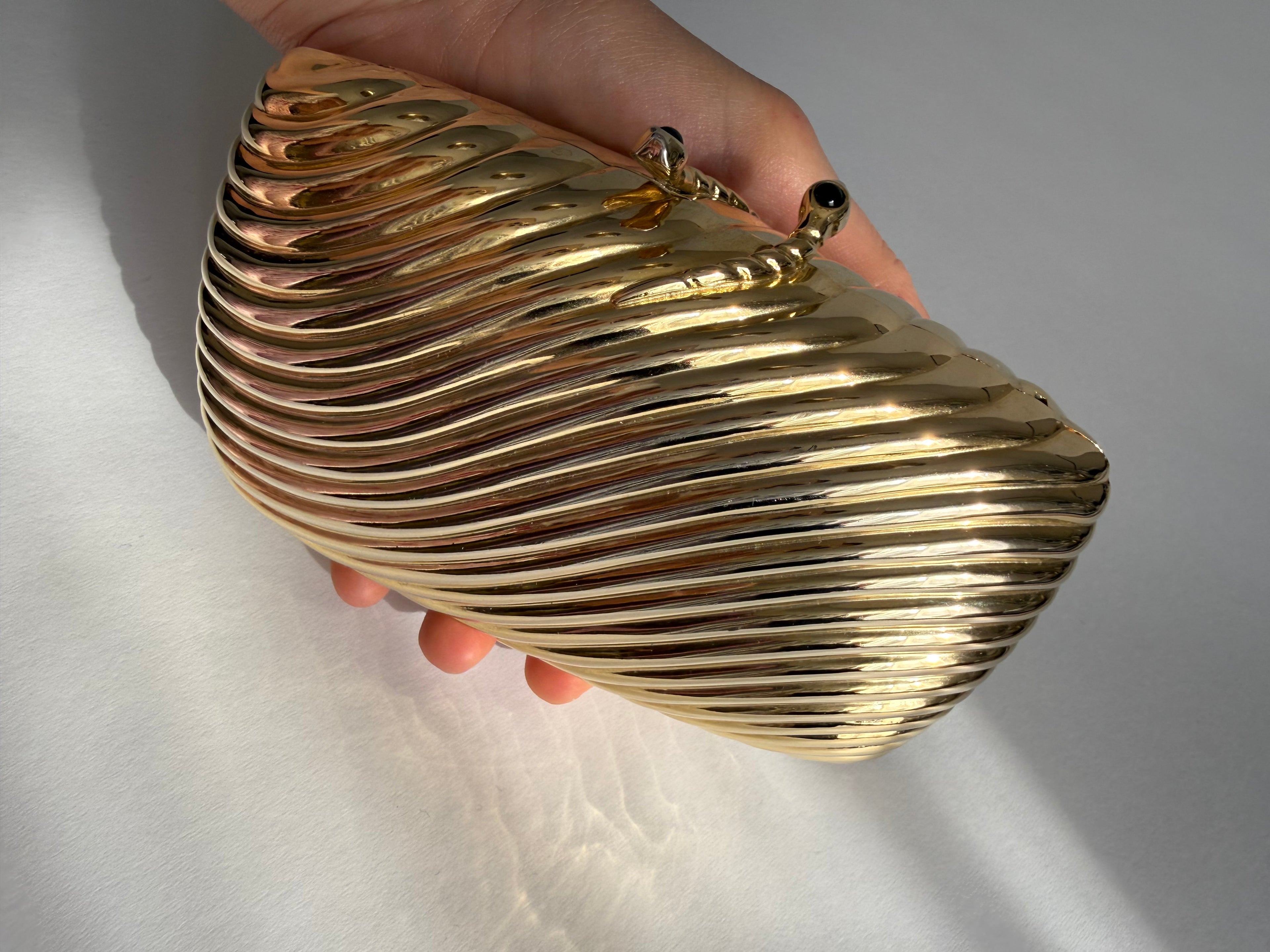 Gold clutch metal Vogini Venice