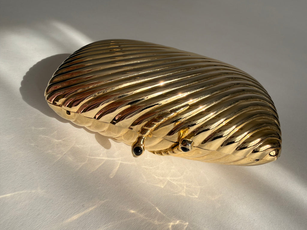 Gold clutch metal Vogini Venice