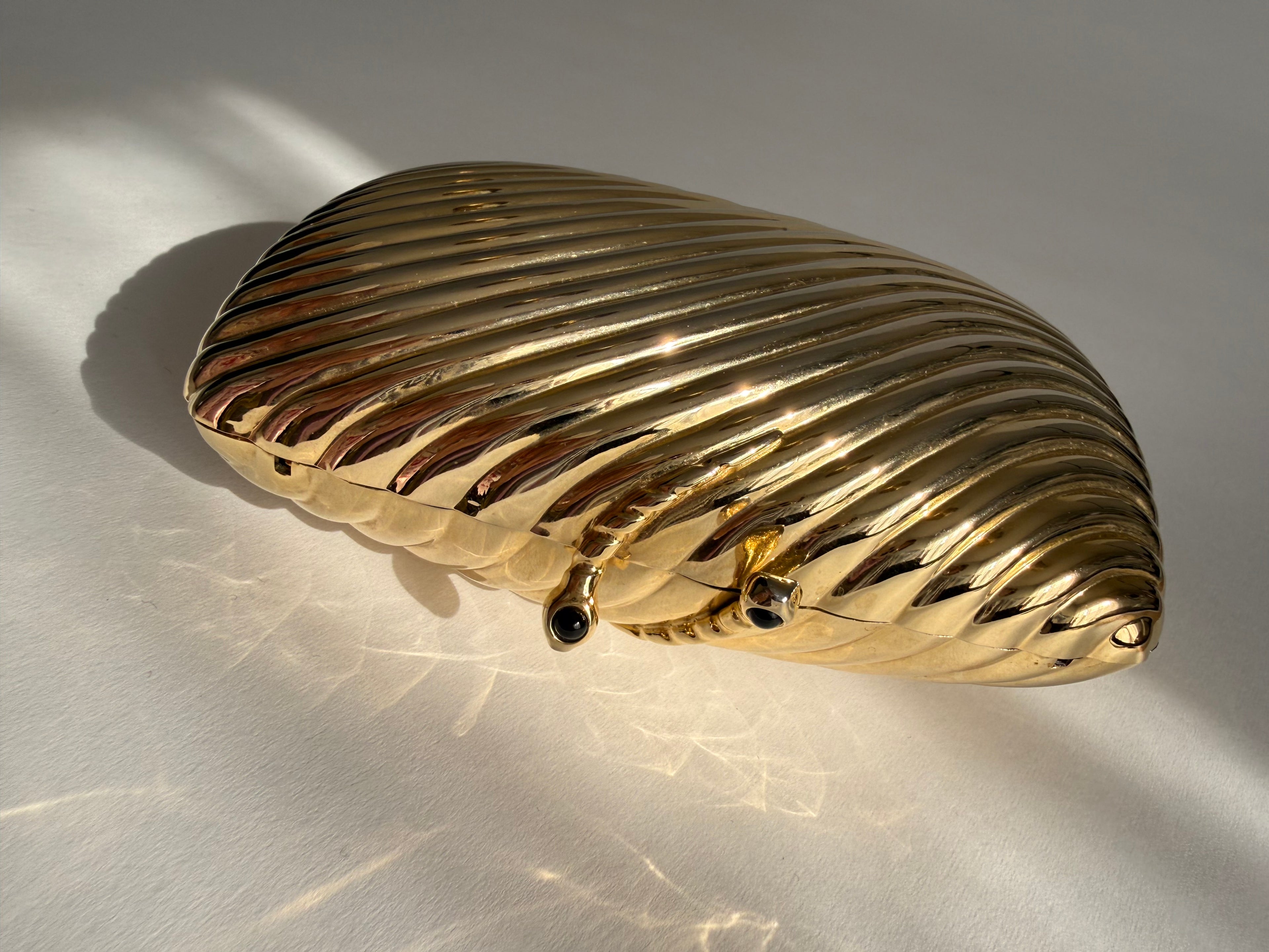 Gold clutch metal Vogini Venice