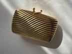 Gold clutch metal Vogini Venice