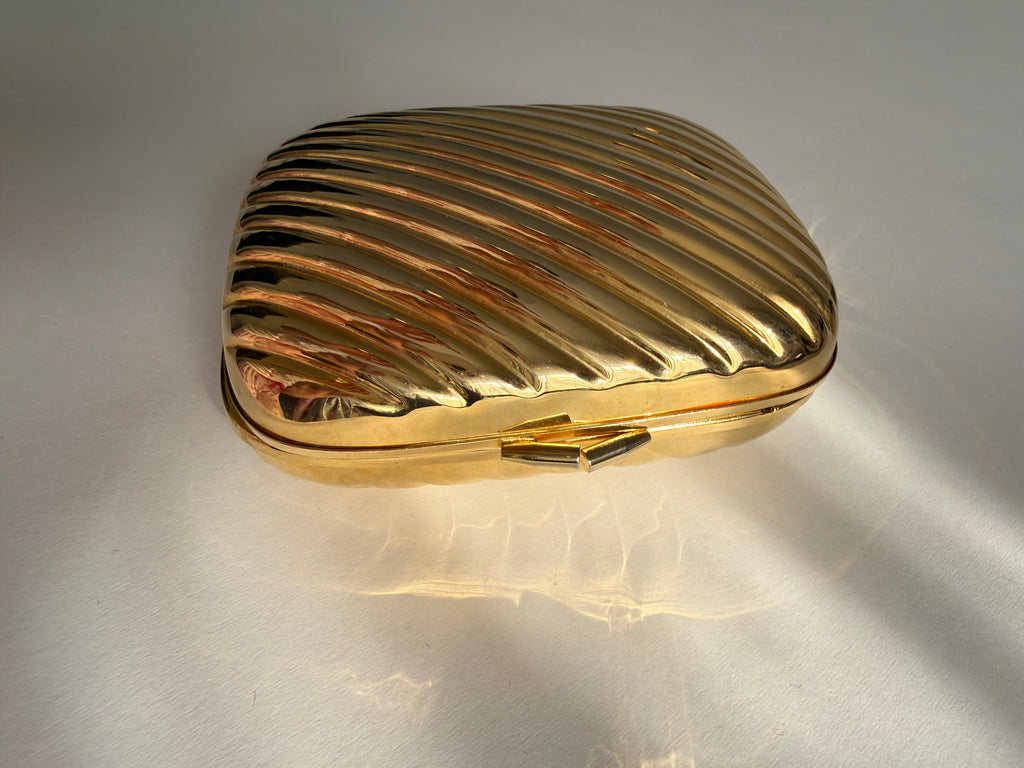 Gold metal clutch