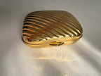 Gold metal clutch