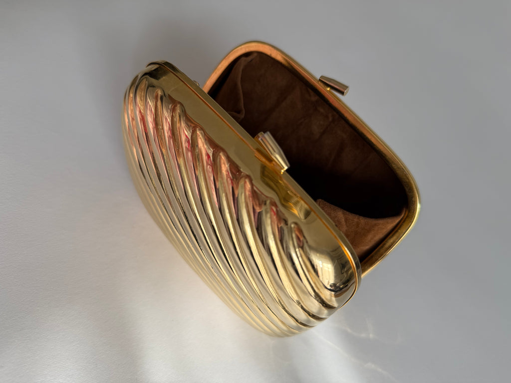 Gold metal clutch