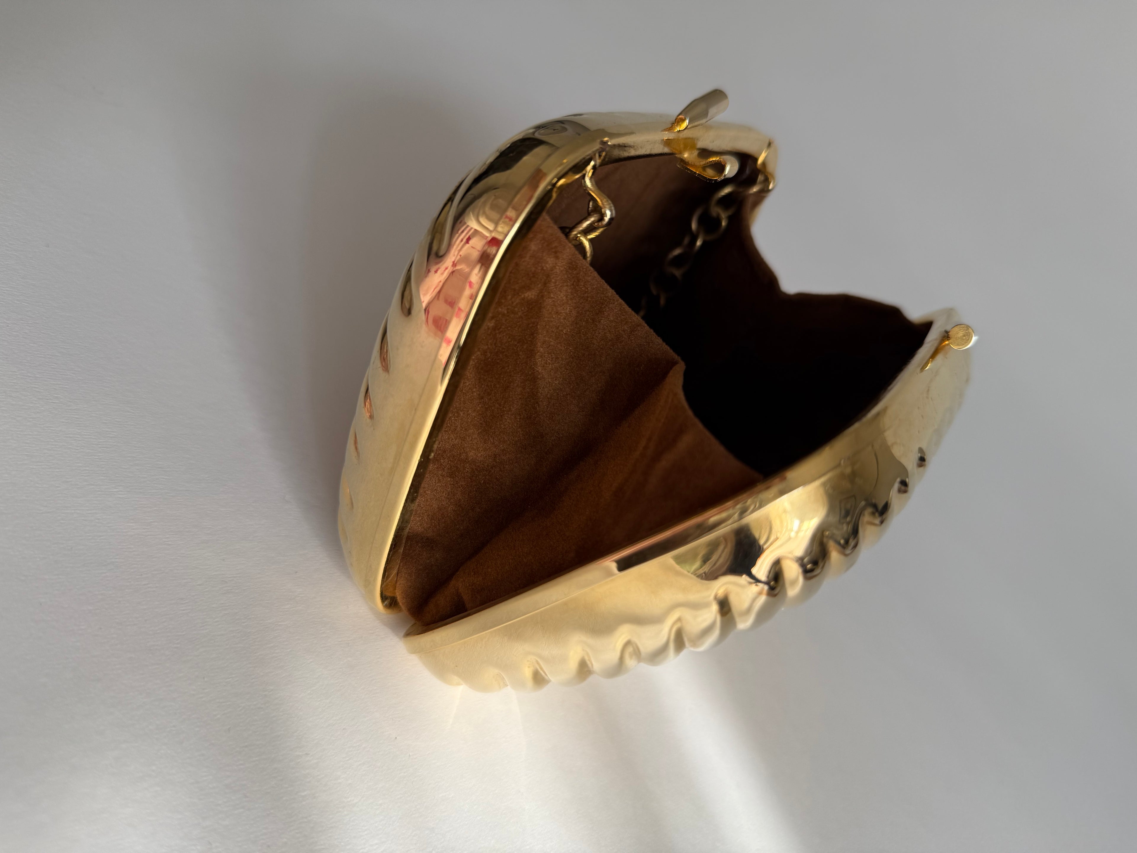 Gold metal clutch