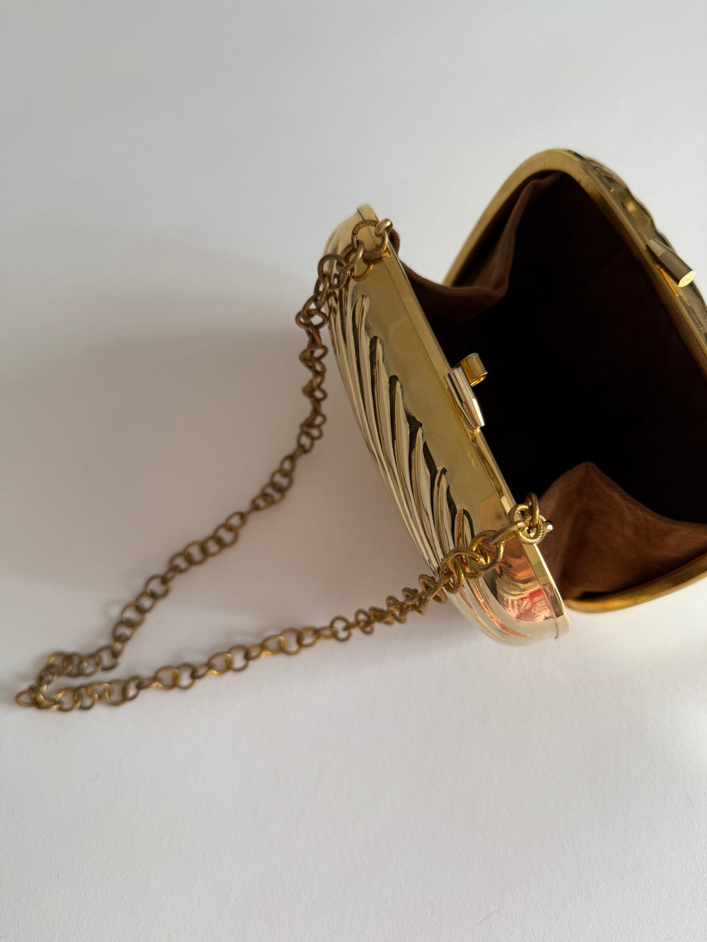 Gold metal clutch