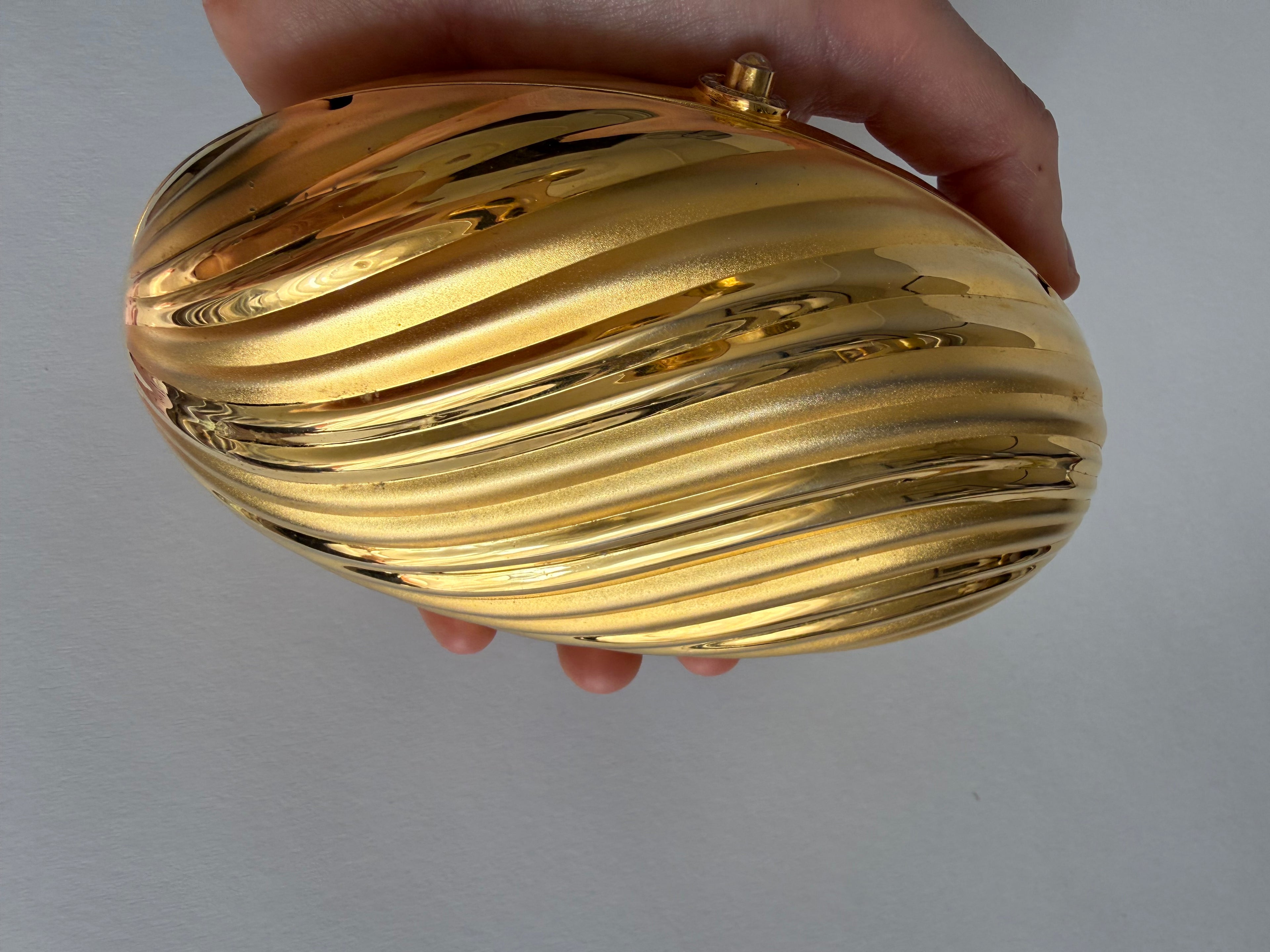 Gold clutch egg 80s