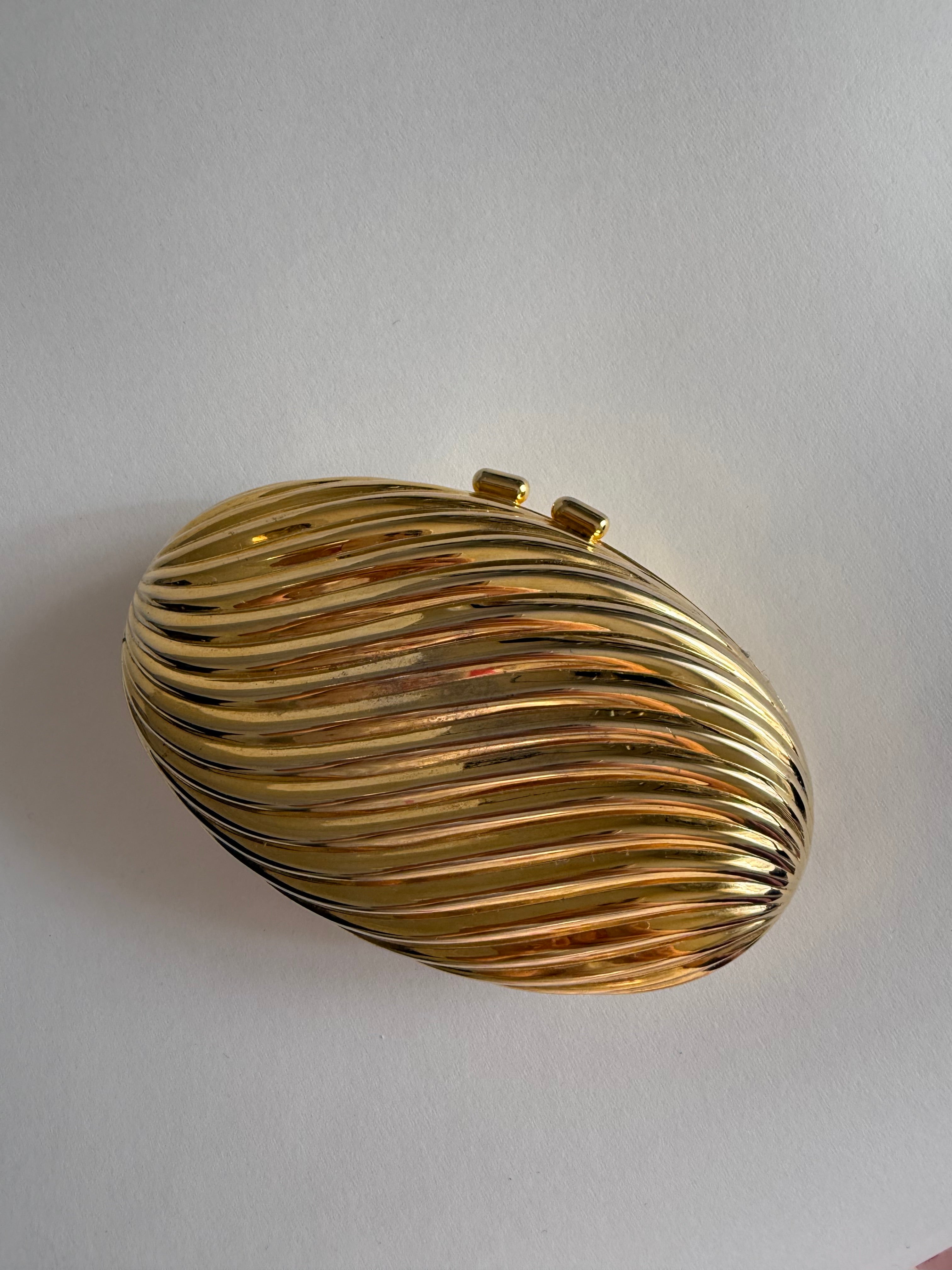 Gold clutch egg tassel