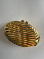 Gold clutch egg tassel