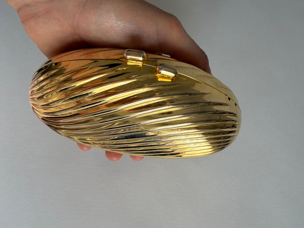 Gold clutch egg tassel