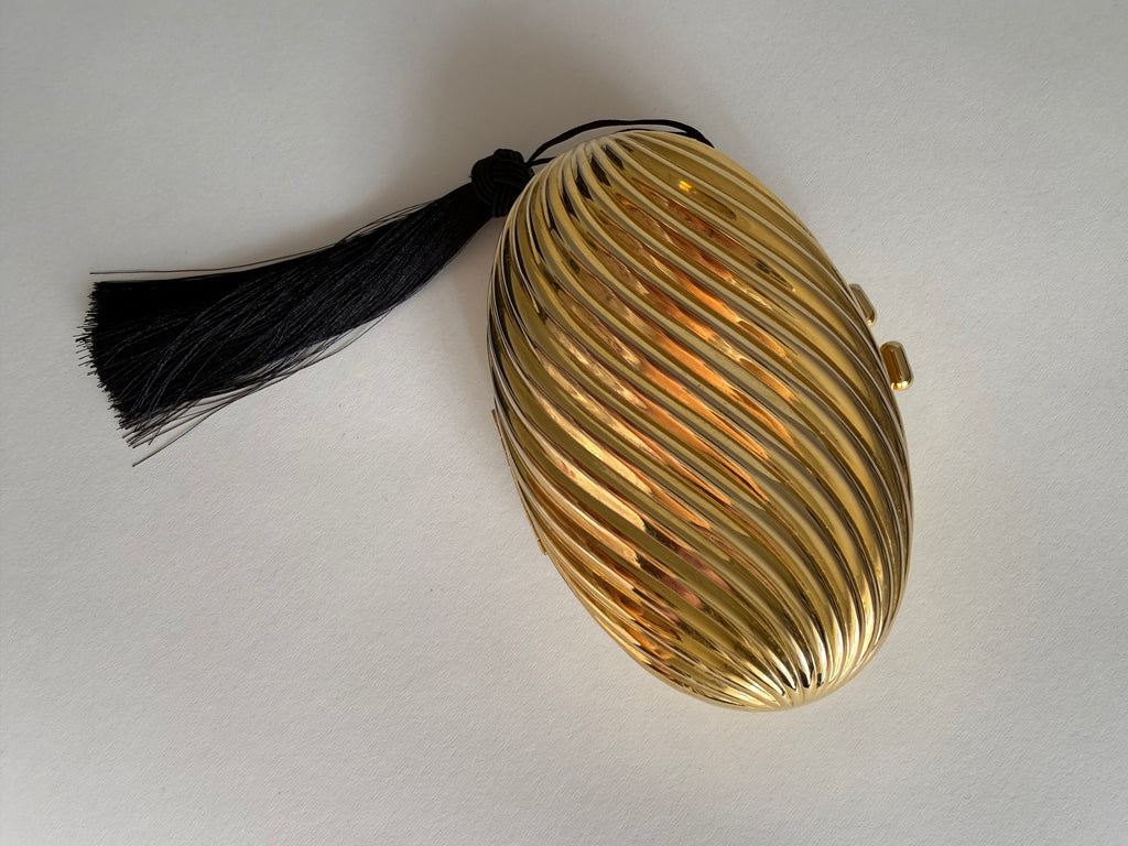 Gold clutch egg tassel
