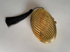 Gold clutch egg tassel