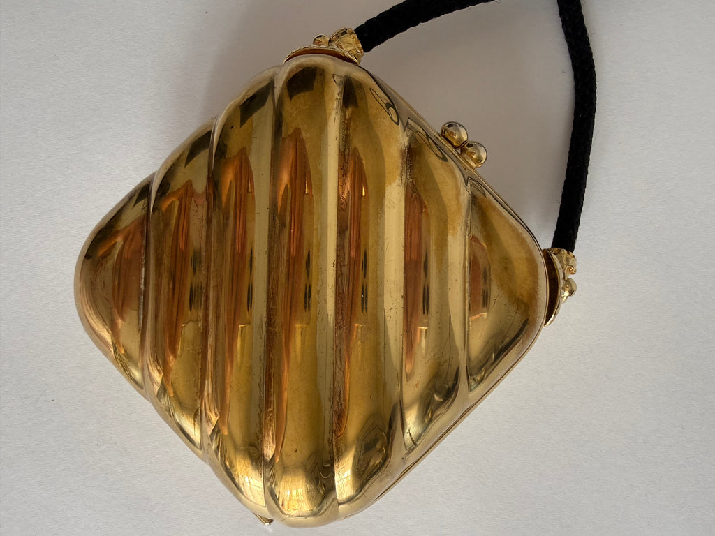Golden clutch 80s