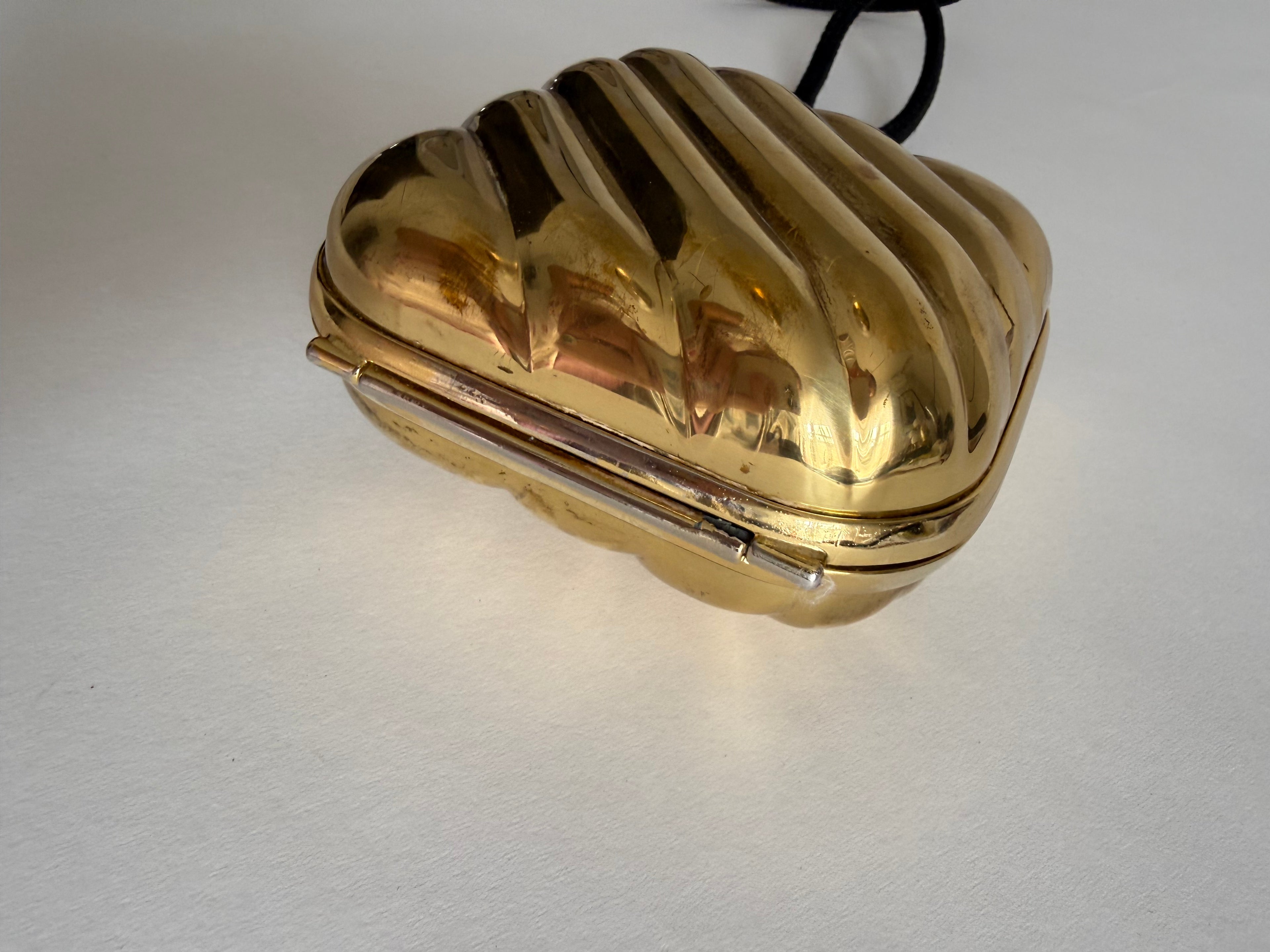 Golden clutch 80s