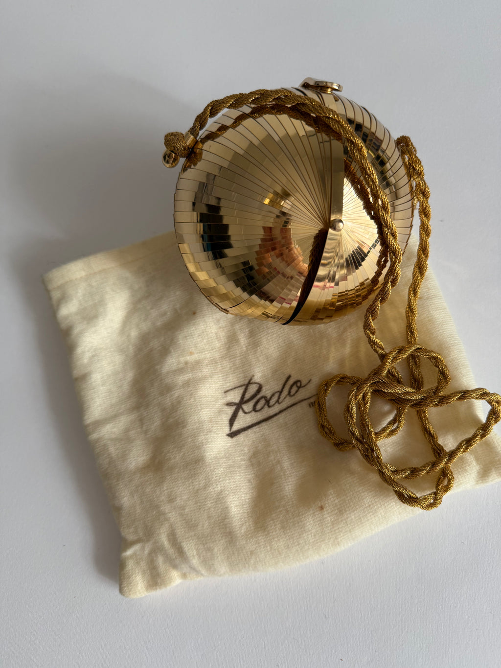 Rodo clutch disc ball shoulder bag