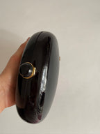 Vintage V black clutch