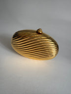 Gold clutch egg 70s
