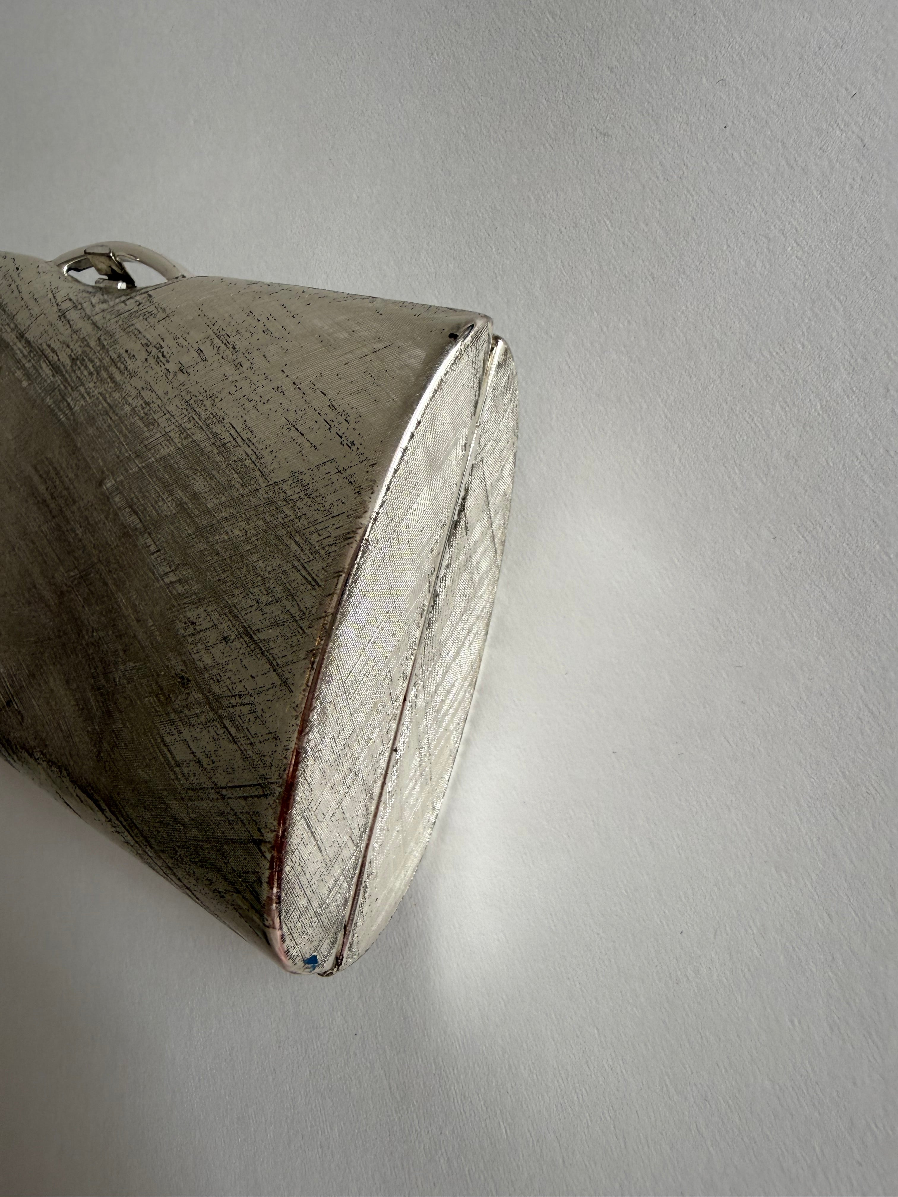 Rodo silver metal clutch