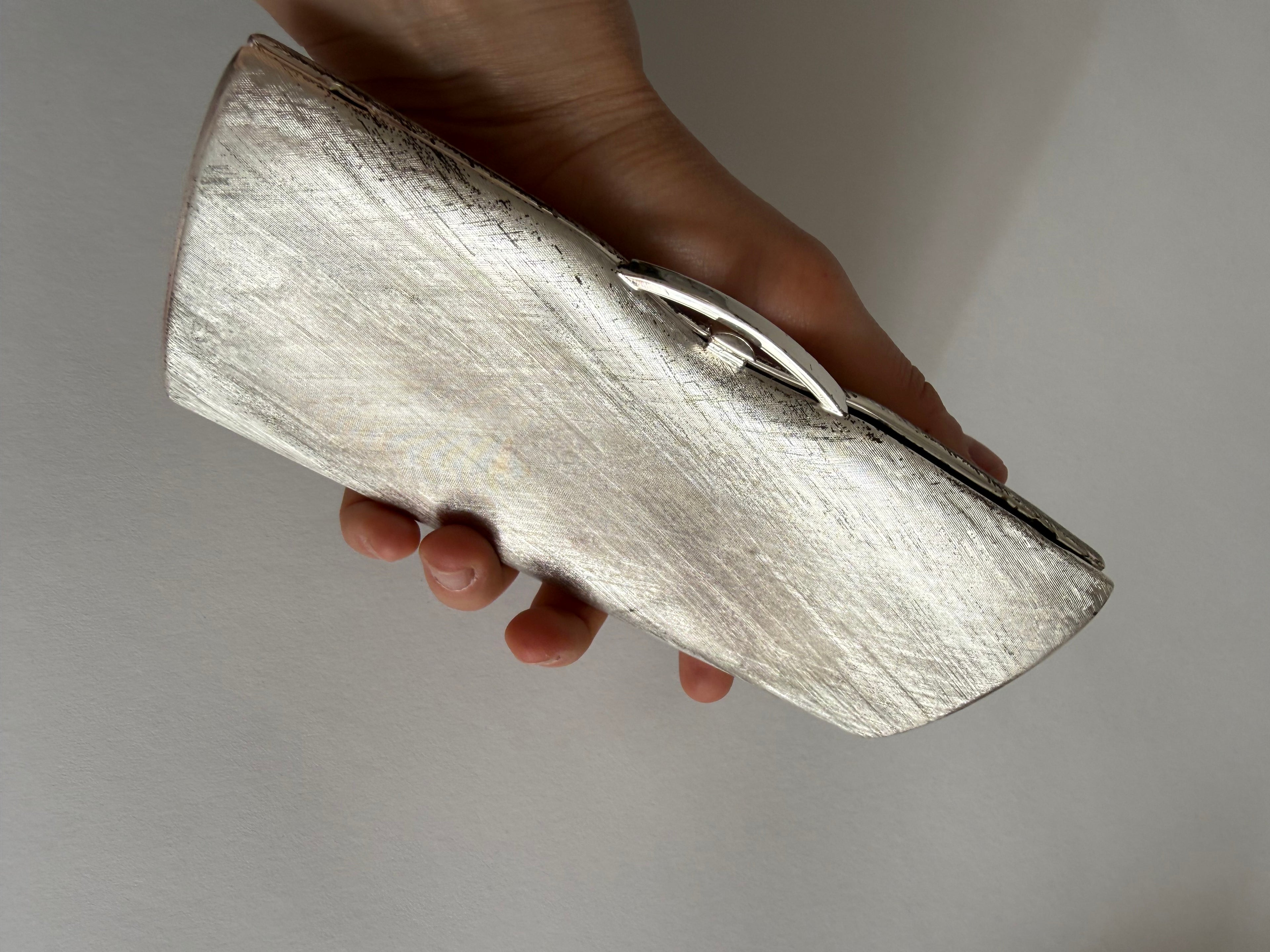 Rodo silver metal clutch