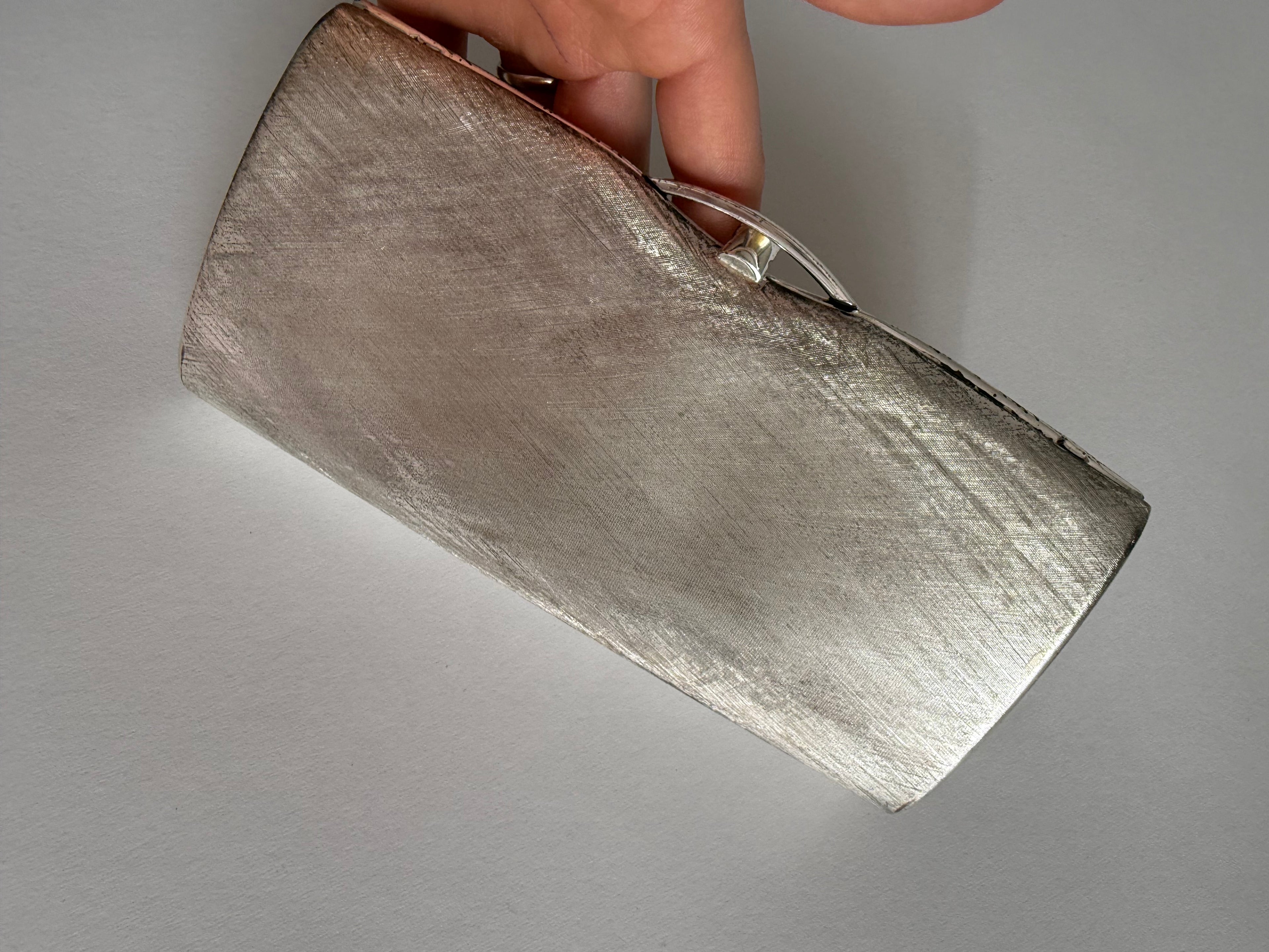 Rodo silver metal clutch