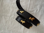 Vintage black belt gold dog