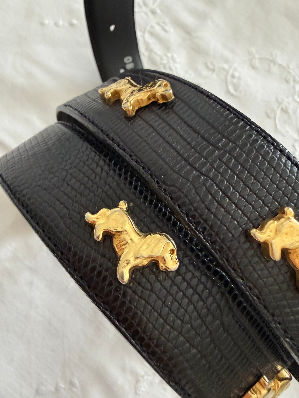 Vintage black belt gold dog