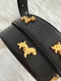 Vintage black belt gold dog
