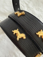 Vintage black belt gold dog