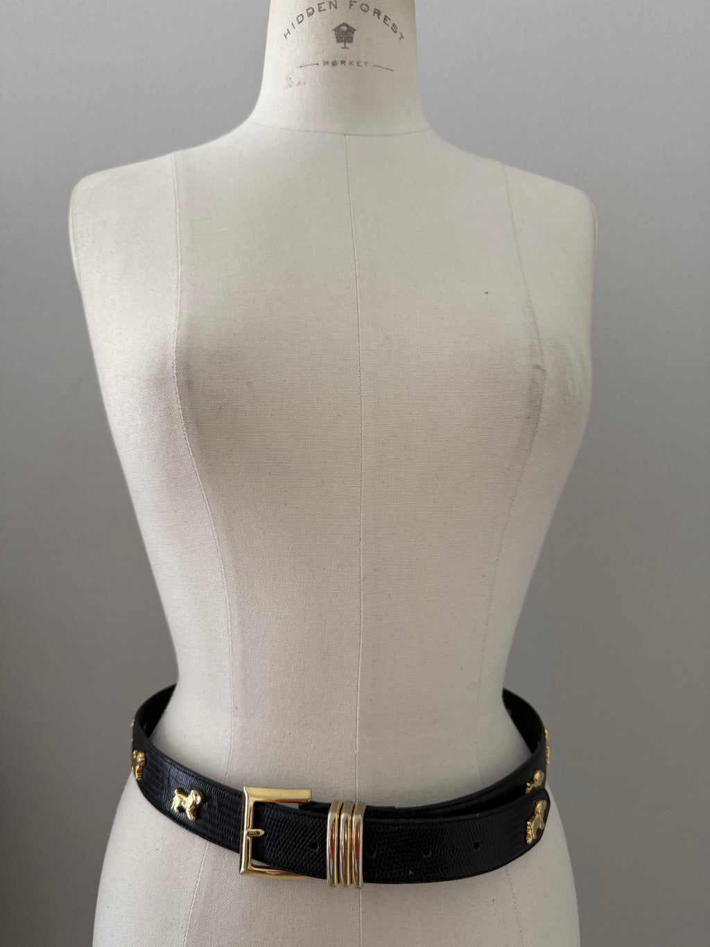 Vintage black belt gold dog