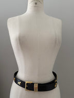 Vintage black belt gold dog