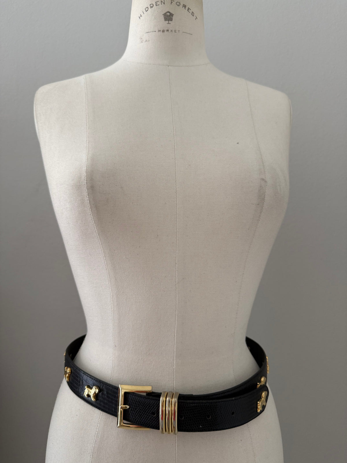 Vintage black belt gold dog