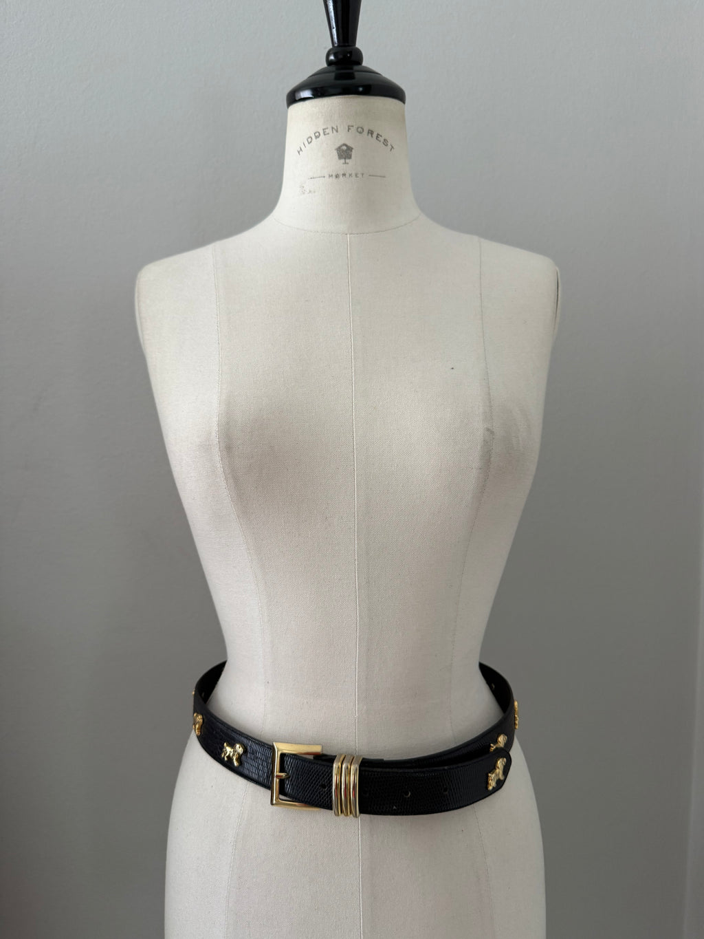 Vintage black belt gold dog