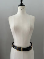 Vintage black belt gold dog
