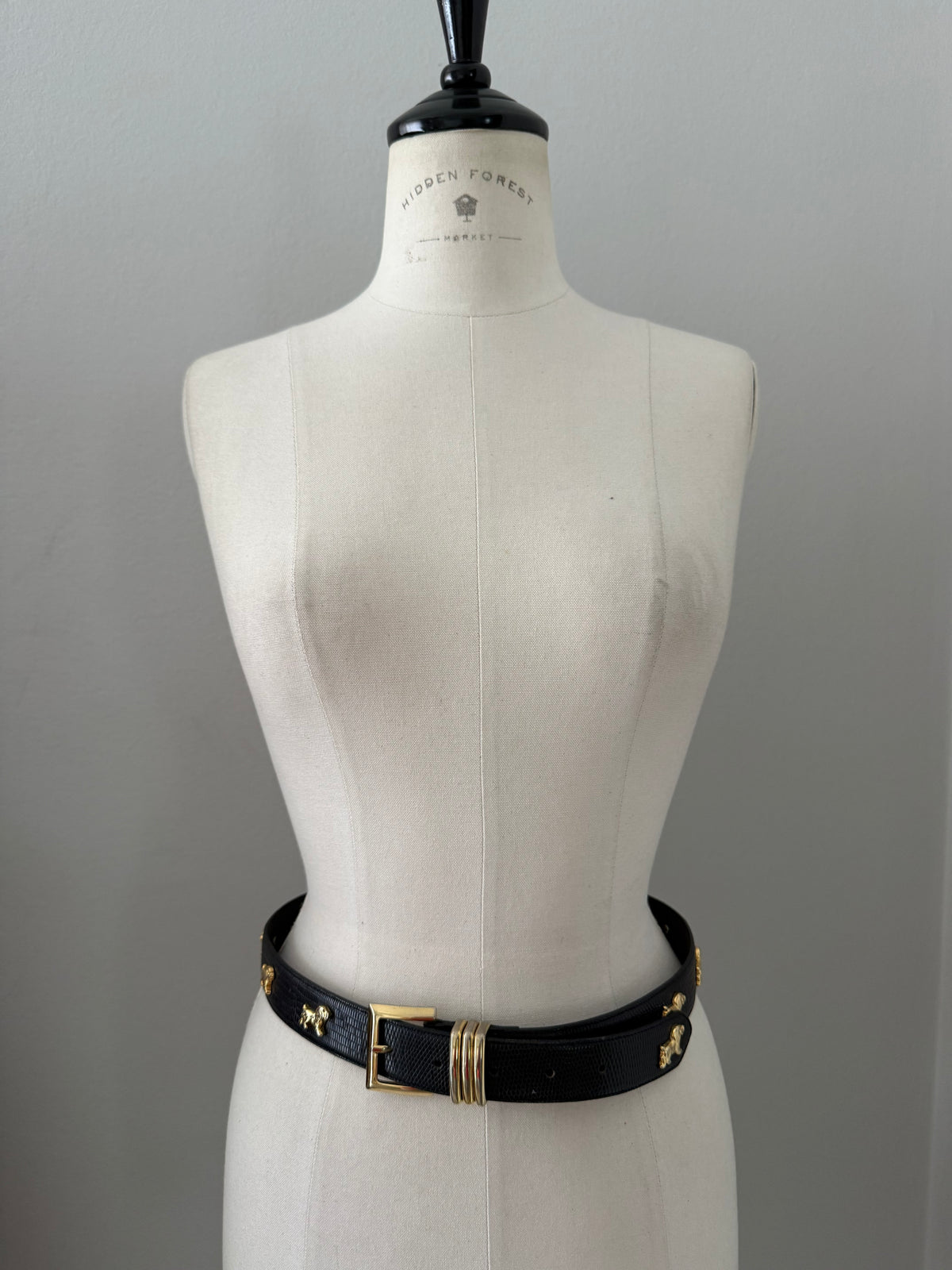 Vintage black belt gold dog