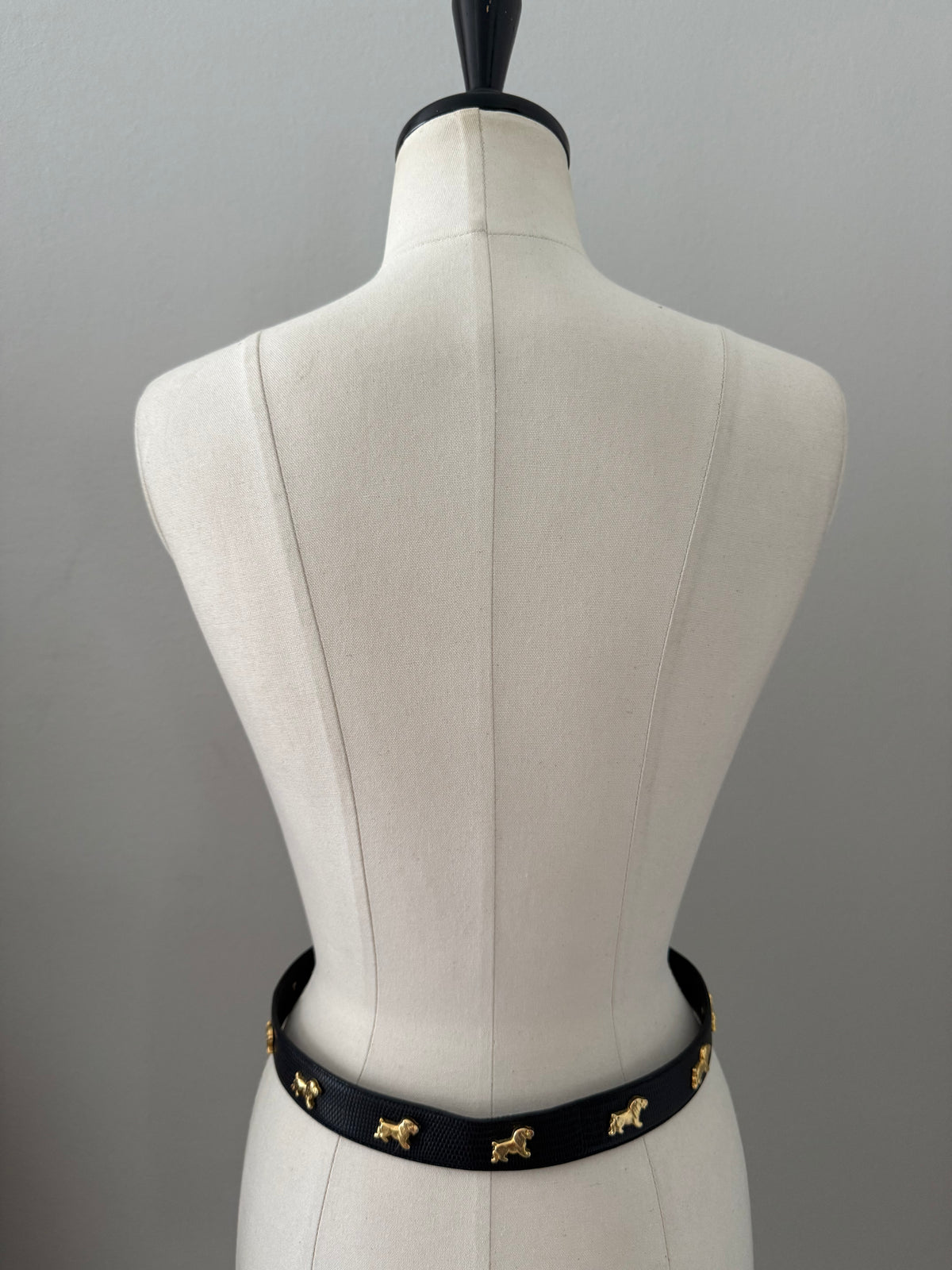 Vintage black belt gold dog