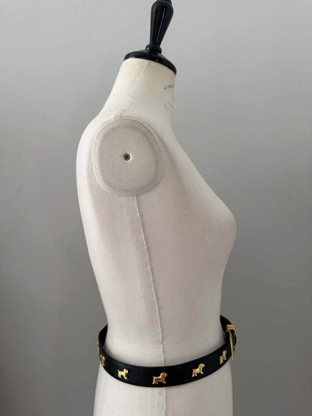 Vintage black belt gold dog