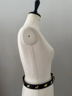Vintage black belt gold dog