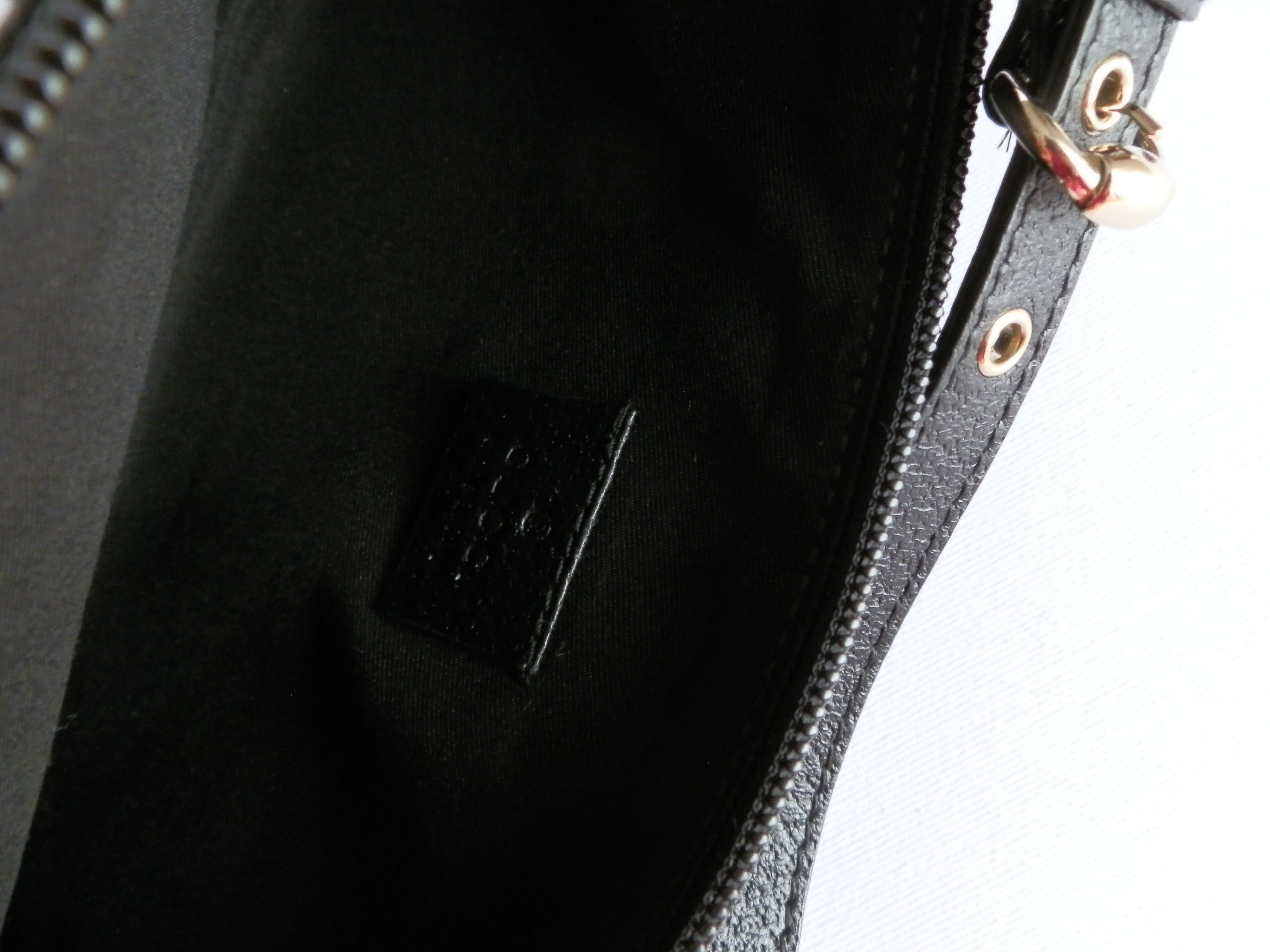 Gucci pochette black monogram