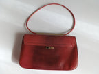 Gucci lizard leather pochette