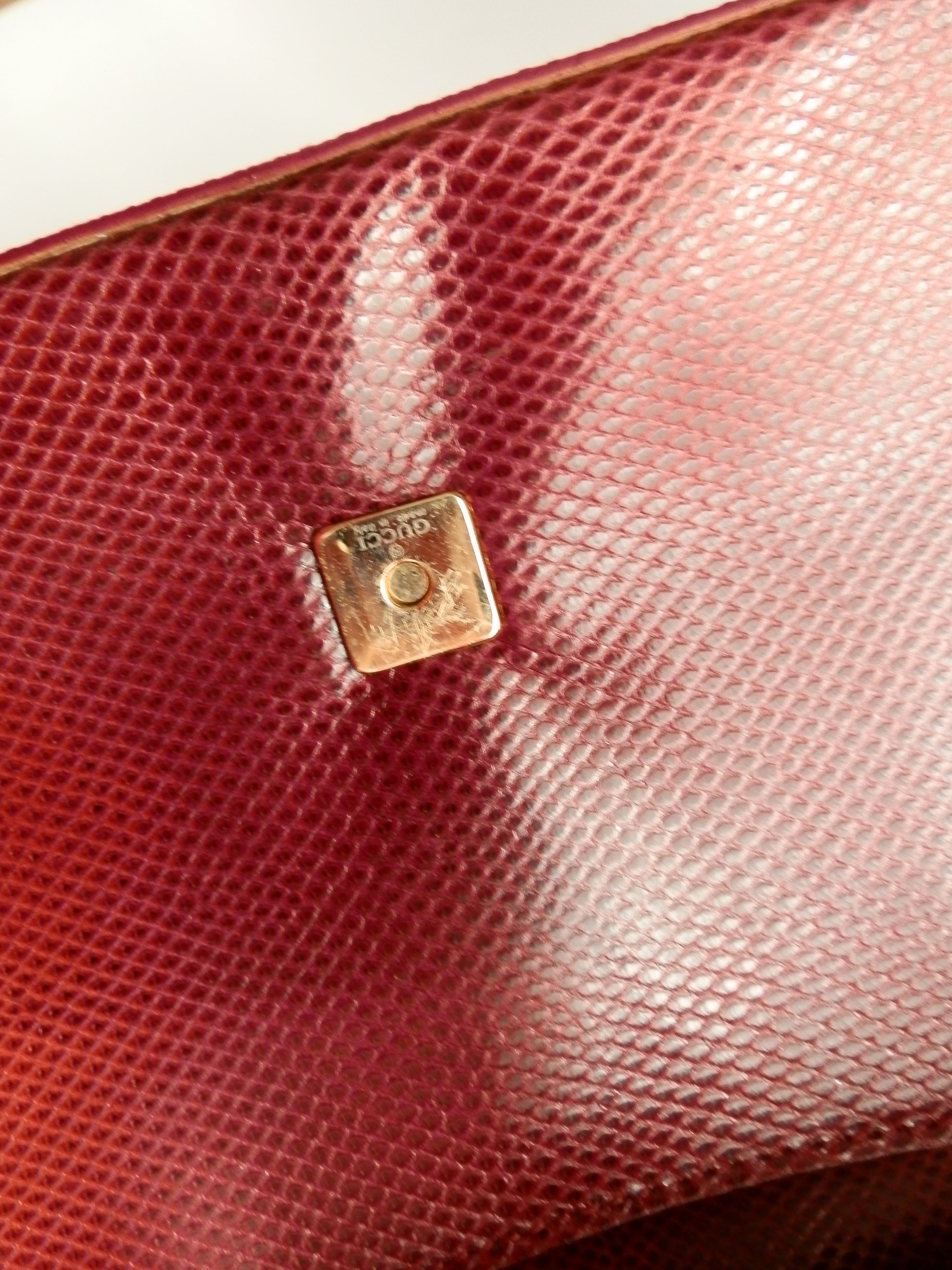 Gucci lizard leather pochette