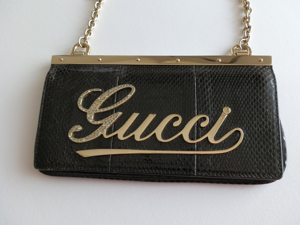 Gucci satin and snake leather pochette