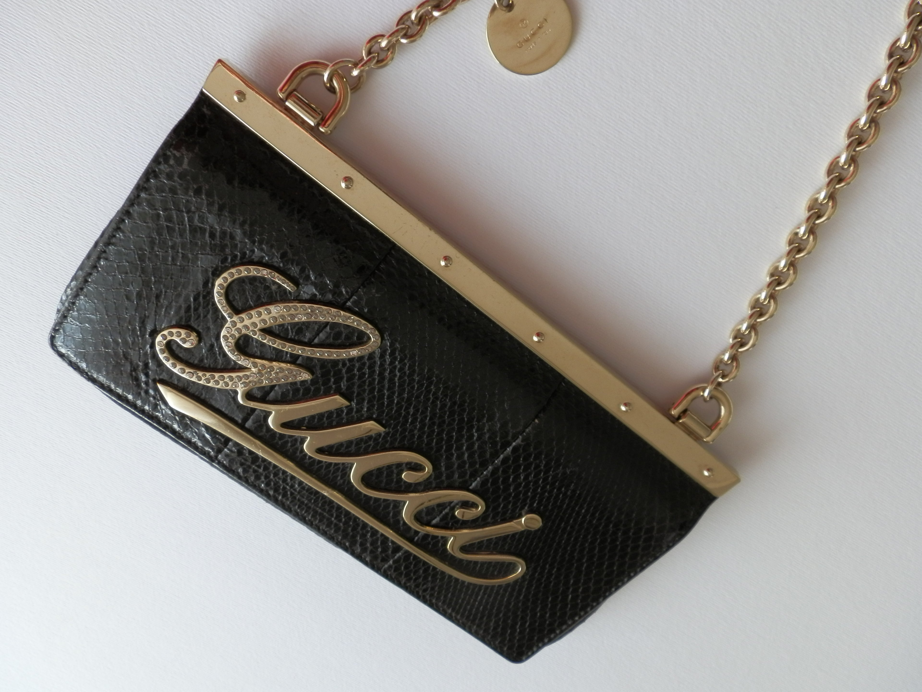 Gucci satin and snake leather pochette