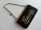 Gucci satin and snake leather pochette
