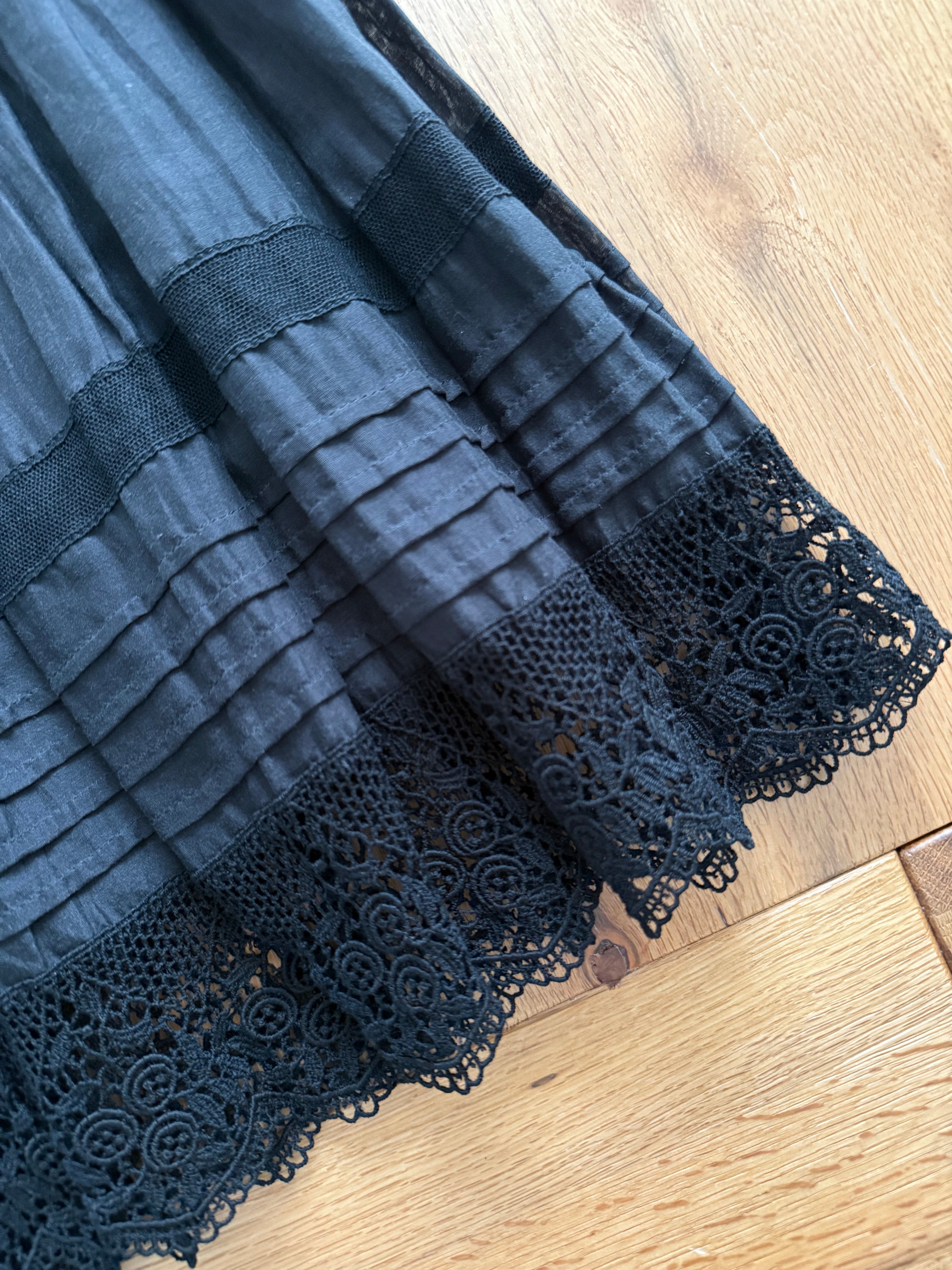 Blumarine SS 2005 mirrors Runway black skirt
