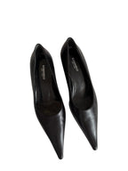 Pointed toe pumps with heel